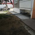 Продолжается ремонт отмостки в МКД по адресу ул. Комсомольская, д. 26