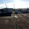 Продолжается капитальный ремонт крыши в доме № 74 по улице Октябрьской революции